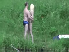 Skinny skank with her chubby aged fuck buddy by the lake